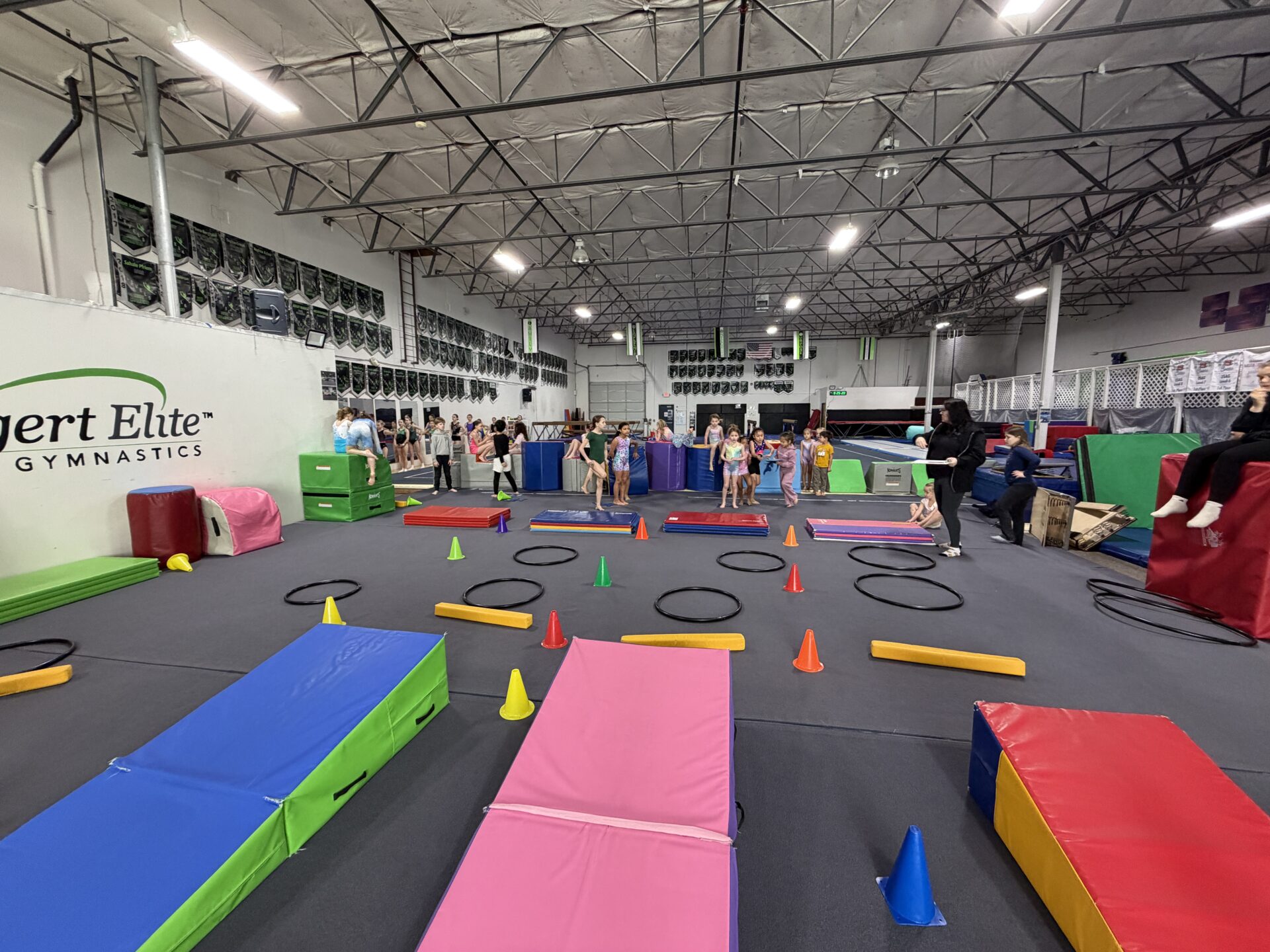 Children's gymnastics obstacle course with colorful mats